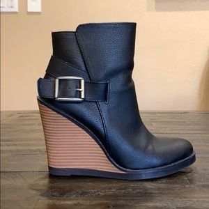 Black leather wedge booties